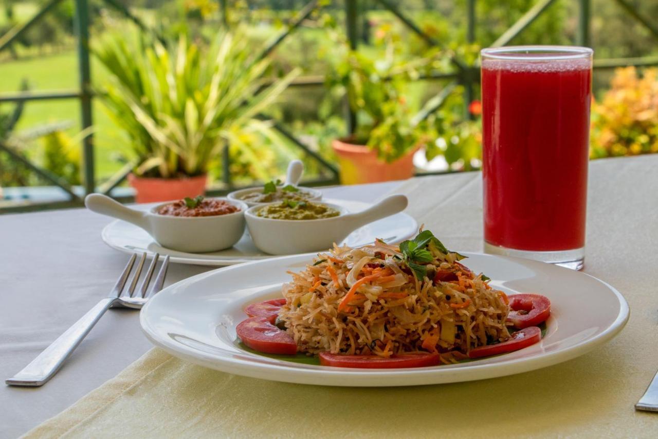 Amritara Ambatty Greens Resort Virajpet Buitenkant foto