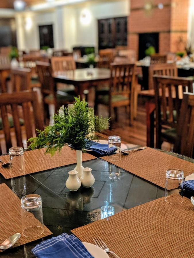 Amritara Ambatty Greens Resort Virajpet Buitenkant foto